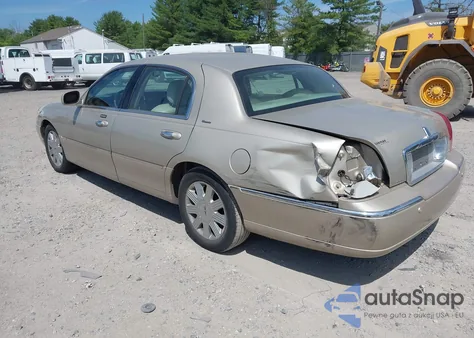 2004 Lincoln Town Car Ultimate из США, поврежденный, VIN 1LNHM83W14Y644745